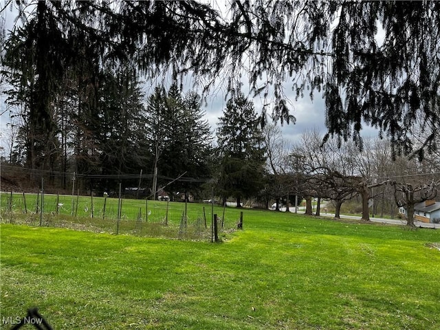 view of yard with fence