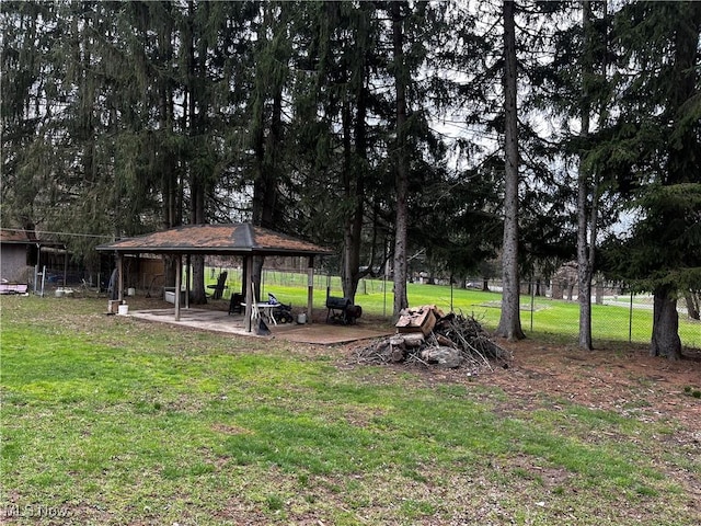 view of yard featuring a gazebo and fence