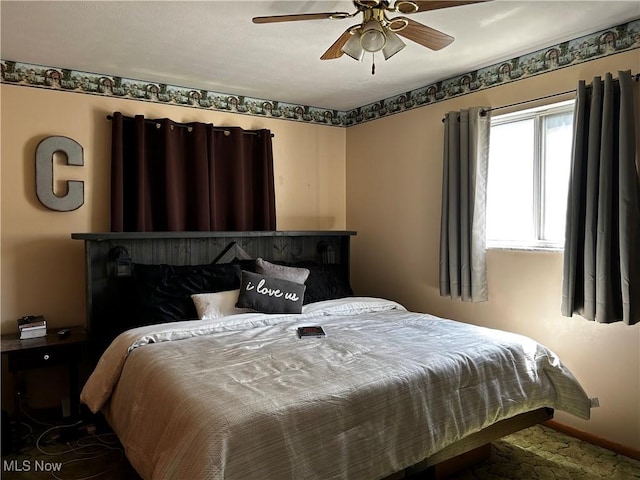3265 Tieber Rd, Stockport, OH 43787 - carpeted bedroom with ceiling fan