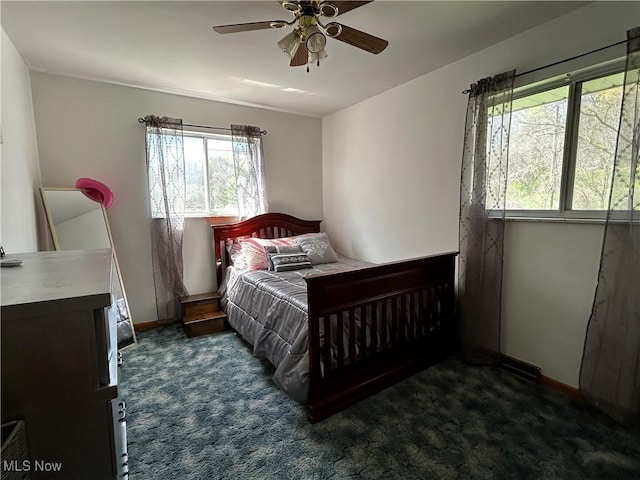 3265 Tieber Rd, Stockport, OH 43787 - bedroom featuring baseboards, a ceiling fan, and dark colored carpet