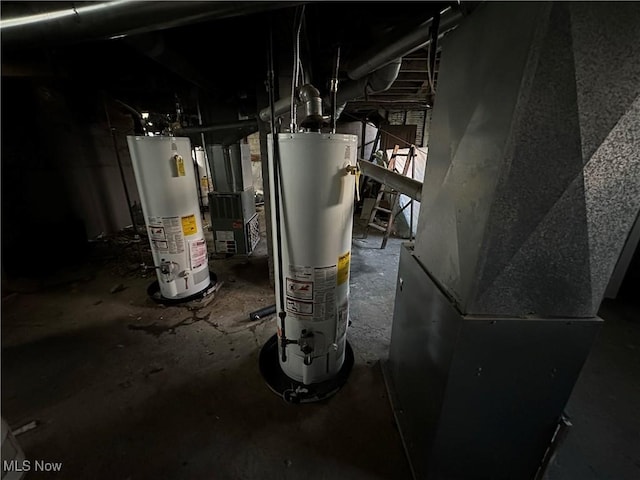 utility room with gas water heater and heating unit