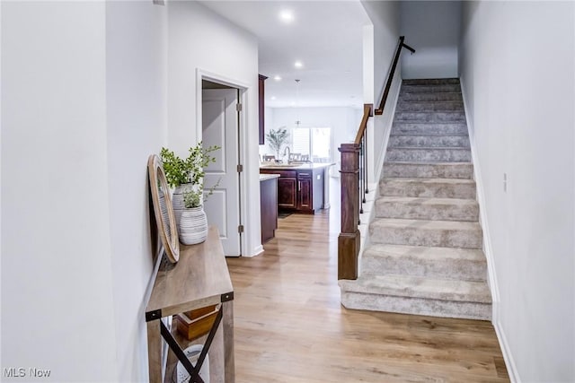 850-4 Dipper Ln, Aurora, OH 44202 - stairs with recessed lighting and wood finished floors