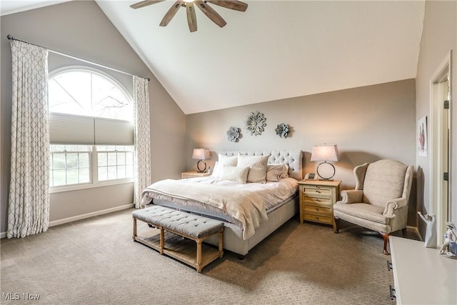 bedroom with ceiling fan, carpet flooring, baseboards, and lofted ceiling