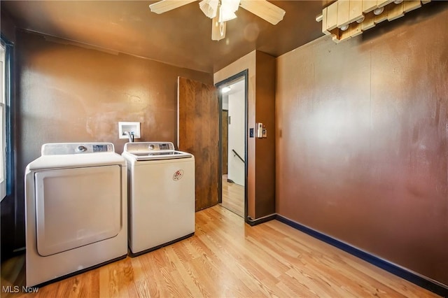 2262 Tanglewood Dr, Salem, OH 44460 - laundry area featuring independent washer and dryer, light wood finished floors, and ceiling fan