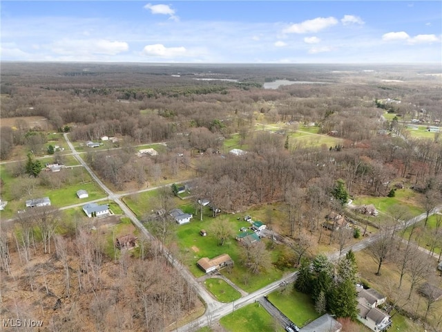 aerial view featuring a view of trees