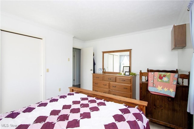 bedroom with crown molding