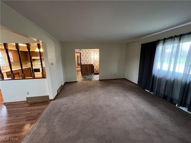 260 Scenery Dr, Weirton, WV 26062 - unfurnished living room featuring wood finished floors and baseboards