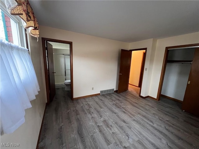 260 Scenery Dr, Weirton, WV 26062 - unfurnished bedroom with wood finished floors, baseboards, a closet, and visible vents