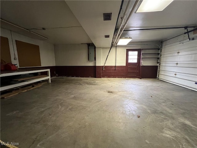260 Scenery Dr, Weirton, WV 26062 - garage featuring visible vents and electric panel
