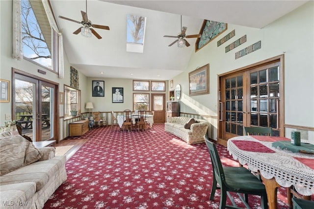 5706 Kemary Ave SW, Navarre, OH 44662 - living area featuring french doors, ceiling fan, and high vaulted ceiling