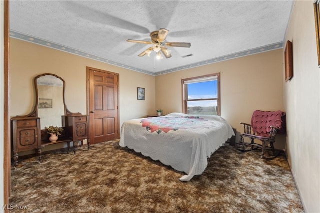 5706 Kemary Ave SW, Navarre, OH 44662 - bedroom with carpet flooring, visible vents, a textured ceiling, and ceiling fan