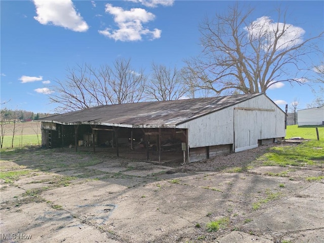 5706 Kemary Ave SW, Navarre, OH 44662 - view of pole building with a carport