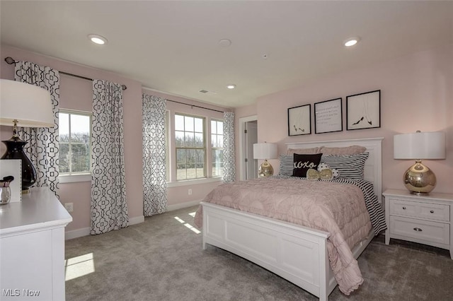 carpeted bedroom with recessed lighting, multiple windows, and baseboards