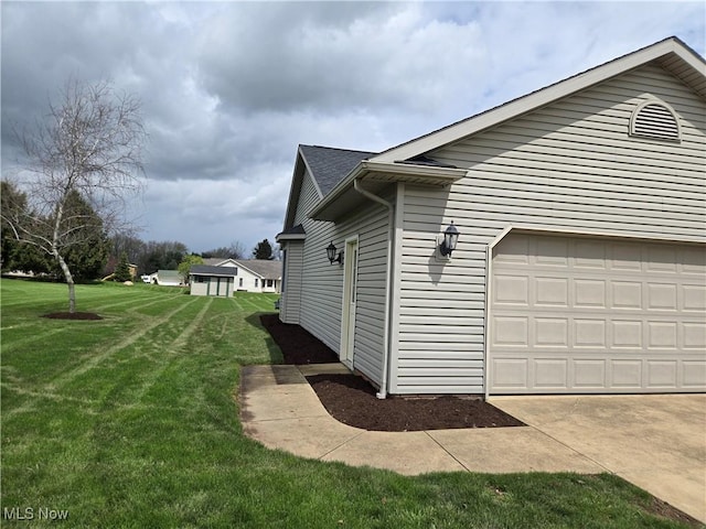 view of home's exterior featuring a garage, a lawn, and roof with shingles