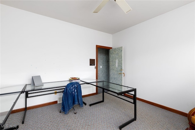 home office with carpet, baseboards, and ceiling fan