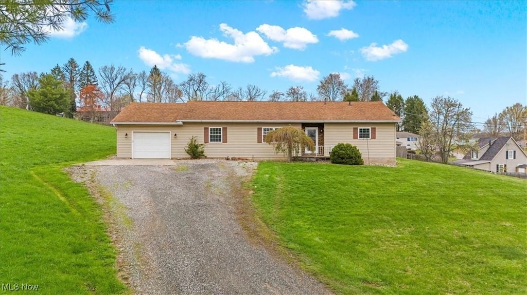 17050 Blackstocking Rd, Caldwell, OH 43724 - single story home with a garage, a front yard, and driveway