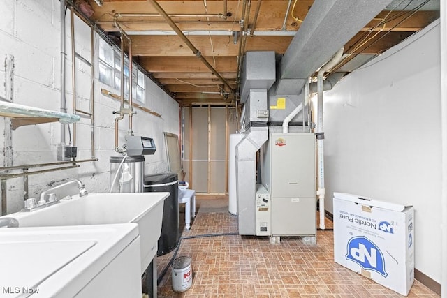 841 W Milton St, Alliance, OH 44601 - unfinished below grade area with a sink and washer / dryer