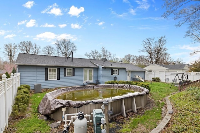 841 W Milton St, Alliance, OH 44601 - rear view of property with a yard and a fenced backyard
