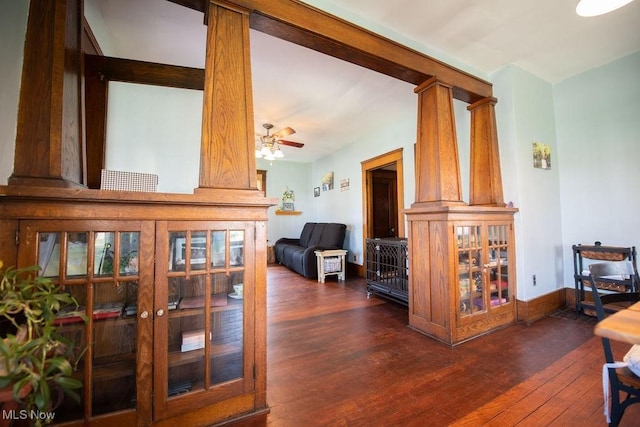 144 S Walnut St, Gnadenhutten, OH 44629 - living room featuring dark wood-type flooring and a ceiling fan