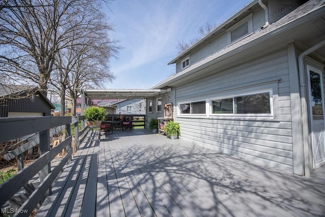 144 S Walnut St, Gnadenhutten, OH 44629 - wooden terrace featuring outdoor dining area