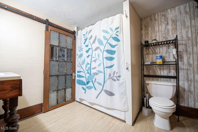 144 S Walnut St, Gnadenhutten, OH 44629 - bathroom with toilet and a shower with curtain