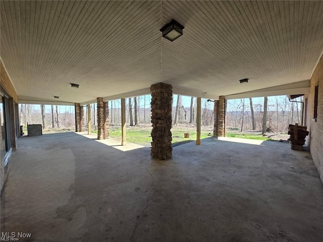view of patio / terrace featuring a carport