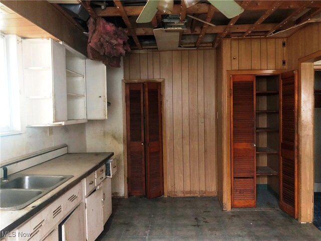 3331-33 W St, Weirton, WV 26062 - kitchen featuring wooden walls, a sink, and open shelves