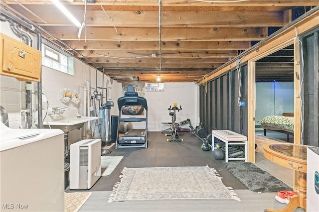 4000 S Mahoning Ave, Alliance, OH 44601 - workout area with washer / dryer, concrete block wall, and a sink