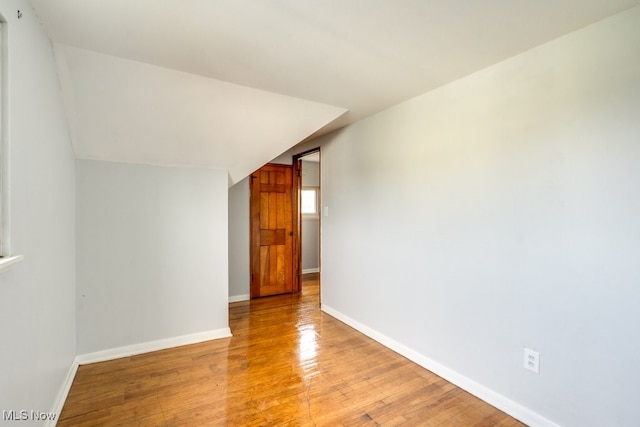 interior space with light wood-style floors and baseboards
