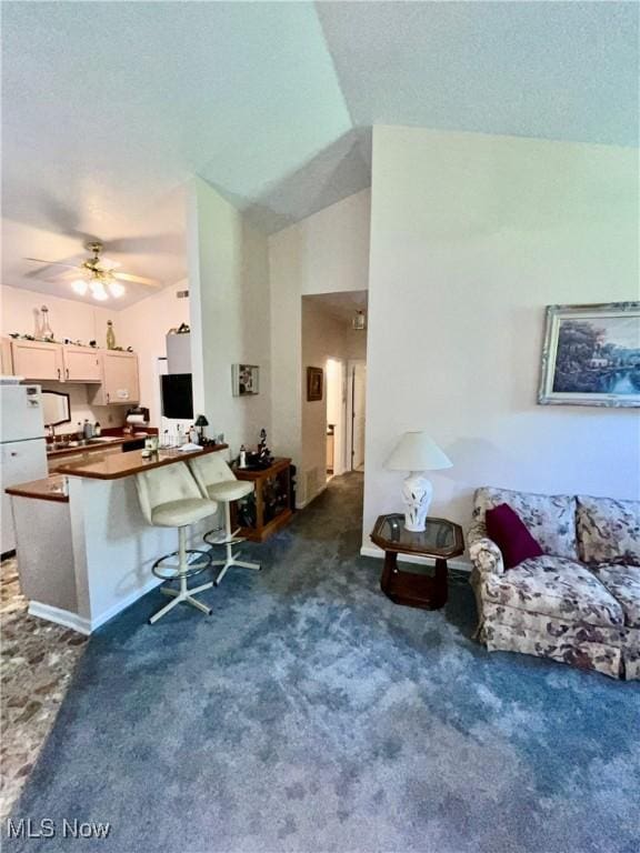 47 Woodland Chase Blvd, Niles, OH 44446 - living room featuring carpet flooring and a ceiling fan