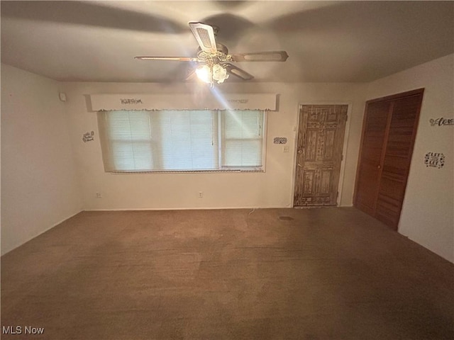 2424 Mccartney Rd, Youngstown, OH 44505 - carpeted empty room with ceiling fan