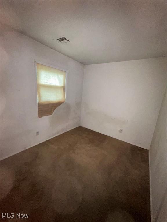 2424 Mccartney Rd, Youngstown, OH 44505 - carpeted spare room with visible vents