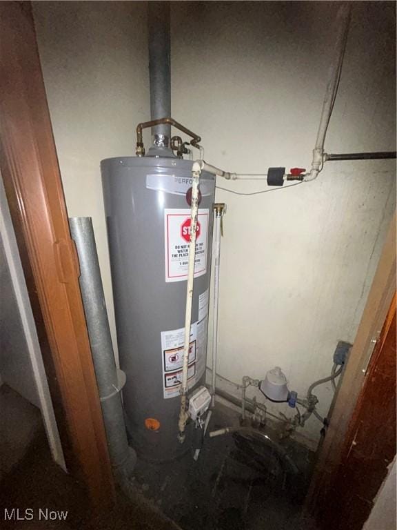 2424 Mccartney Rd, Youngstown, OH 44505 - utility room featuring water heater