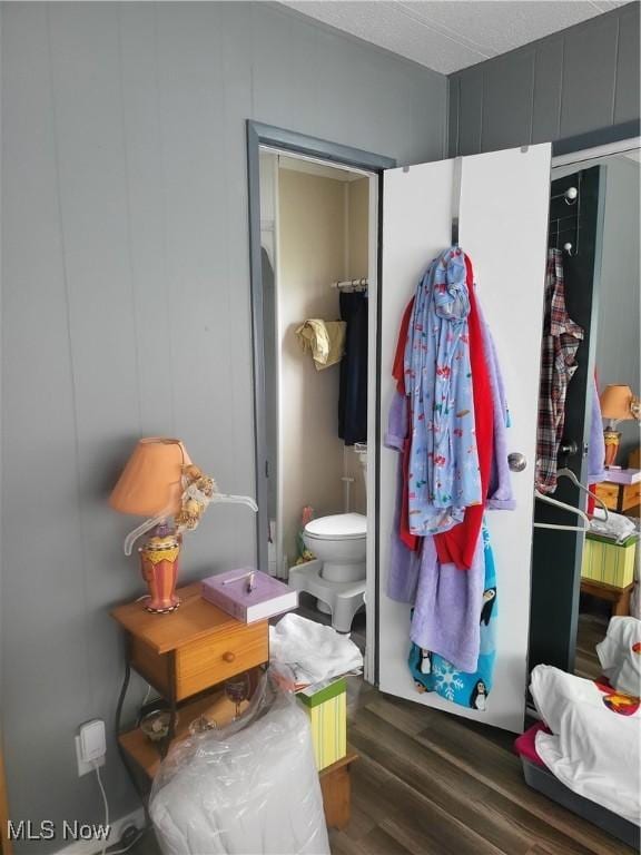 58 Wilpark Dr, Akron, OH 44312 - interior space featuring toilet and wood finished floors