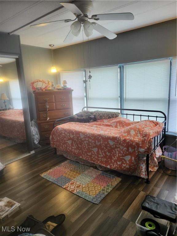 58 Wilpark Dr, Akron, OH 44312 - bedroom with dark wood-style flooring and ceiling fan