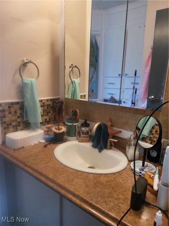 58 Wilpark Dr, Akron, OH 44312 - bathroom featuring tasteful backsplash and vanity