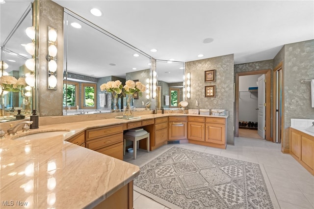 11955 Epping Trl, Chardon, OH 44024 - bathroom with wallpapered walls, tile patterned flooring, vanity, recessed lighting, and a spacious closet