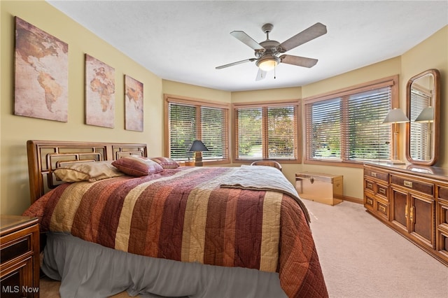 11955 Epping Trl, Chardon, OH 44024 - bedroom featuring light carpet, baseboards, and ceiling fan