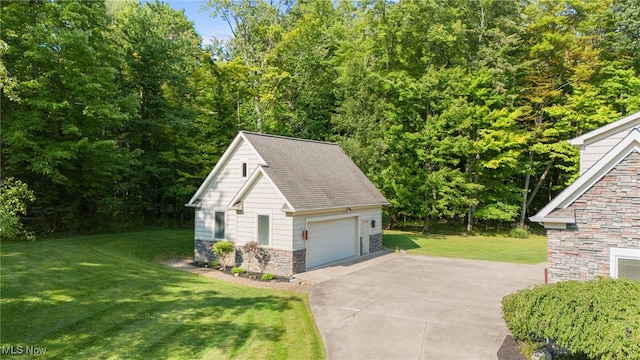 11955 Epping Trl, Chardon, OH 44024 - view of property exterior with stone siding, a lawn, a detached garage, and an outbuilding