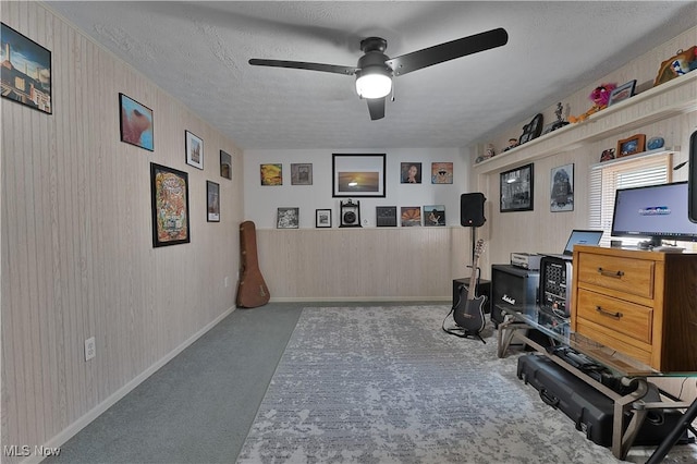 1863 Beaver Trl, Mineral Ridge, OH 44440 - interior space with baseboards, carpet floors, a textured ceiling, and ceiling fan