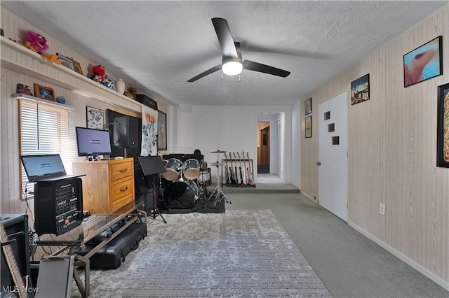 1863 Beaver Trl, Mineral Ridge, OH 44440 - interior space featuring wooden walls, baseboards, a ceiling fan, and a textured ceiling
