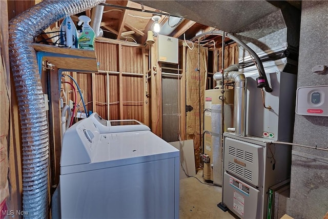 1863 Beaver Trl, Mineral Ridge, OH 44440 - laundry area featuring washer / clothes dryer, laundry area, and gas water heater