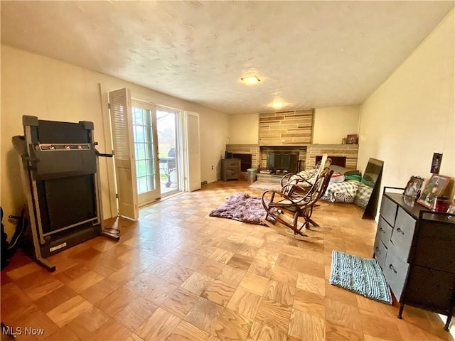 interior space with a stone fireplace