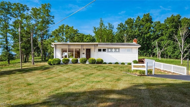 165 Reservoir Rd, New Concord, OH 43762 - view of front of house with a front lawn and fence