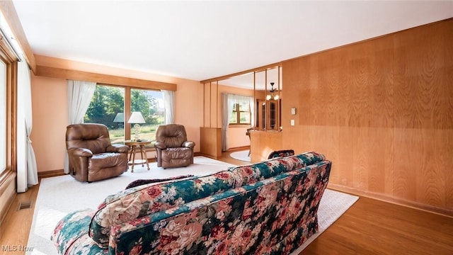 165 Reservoir Rd, New Concord, OH 43762 - living room with wood finished floors, baseboards, and visible vents