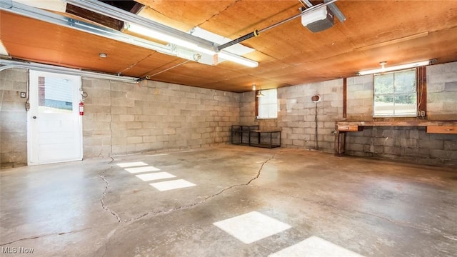 165 Reservoir Rd, New Concord, OH 43762 - basement with concrete block wall and a garage
