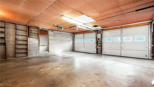 165 Reservoir Rd, New Concord, OH 43762 - garage featuring a garage door opener