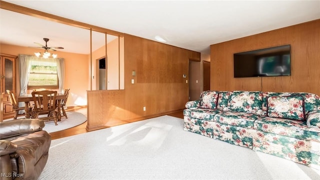165 Reservoir Rd, New Concord, OH 43762 - living room with wooden walls and ceiling fan