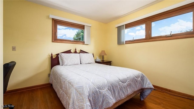 165 Reservoir Rd, New Concord, OH 43762 - bedroom with baseboards and wood finished floors