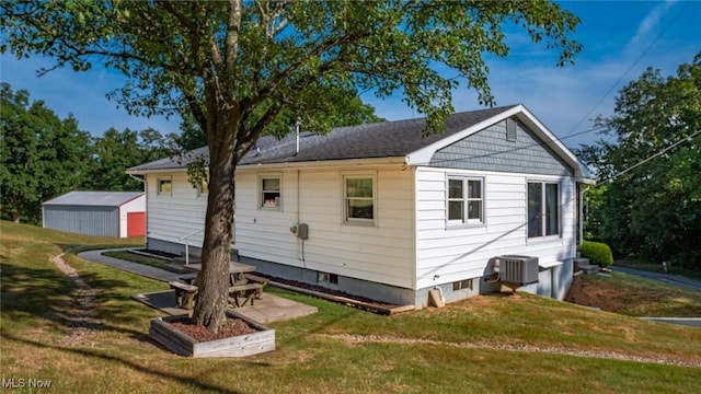 165 Reservoir Rd, New Concord, OH 43762 - back of house with a lawn